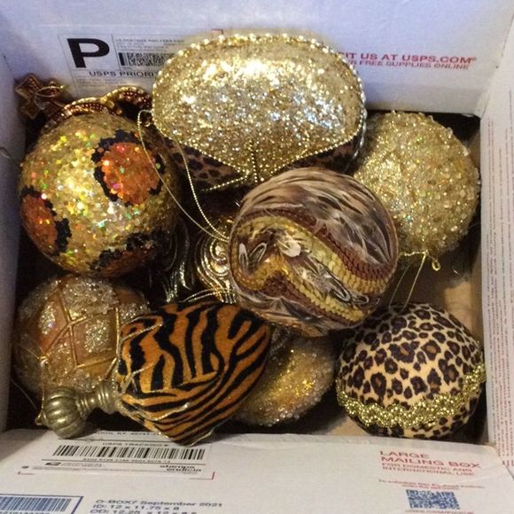 13 Horchow classy leopard and gold decorations. With 6 ropes of garland36 ft.